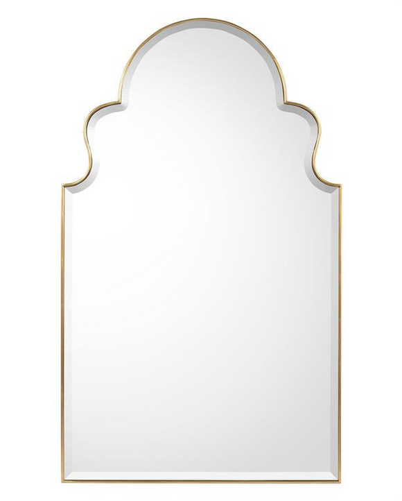 A decorative mirror with a wide, ornate gold frame, hanging on a plain white wall.