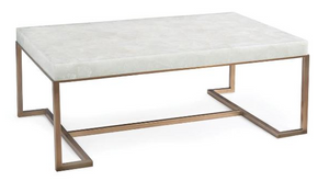 A luxurious coffee table with a polished white marble top and a gleaming gold frame.