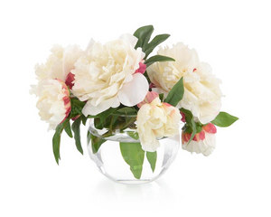 A bowl with a crystal bottom holds real-touch garden peonies in faux water.