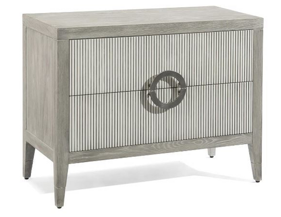 A gray dresser with two drawers and brass knobs. The dresser has a smooth, polished finish and simple design.